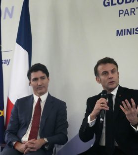 French President Emmanuel Macron, right, and Canada's Prime Minister Justin Trudeau at the French Foreign Ministry ahead of the AI Action Summit in Paris, Sunday, Feb. 9, 2025. (AP Photo/Michel Euler, Pool)